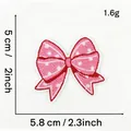Detail view of pink polka dot bow embroidery patch showing dimensions 5.8cm by 5cm - Pink Bow Style 5 (Polka Dot)