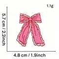 Detailed view of pink bow embroidery patch with dimensions 4.8 x 5.7 cm and 1.1g weight. - Pink Bow Style 8 (Wavy Edge)