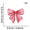 Detail of pink bow embroidered patch showing 5.9cm x 5.3cm dimensions and texture. - Pink Bow Style 13 (Bi-color)