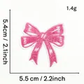 Detail showing measurements 5.5cm x 5.4cm and texture of pink embroidered bow patch - Pink Bow Style 15 (Plain)