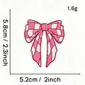 Detailed macro view of pink checkered bow embroidered patch showing precise dimensions and 1.6g weight - Pink Bow Style 18 (Grid Pattern)
