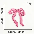 Detail view of a pink bow embroidered patch showing precise dimensions of 5.1cm x 5cm - Pink Bow Style #24 (Plain Pink White Border)