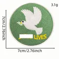 7cm round green embroidered dove iron-on patch for clothing decoration and repair - Style 11 (Cartoon English Patch 11#)