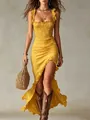 Chic yellow ruffled high-slit strap dress styled with brown cowboy boots for summer - S / Dresses / Yellow