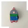 Vibrant color-block children's backpack with black striped pattern and red straps - One Size / Black & White Stripes