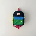 Detailed macro view of a colorful color-blocked children's backpack for school kids - One Size / Black
