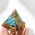 Close-up of 5cm Orgone pyramid with turquoise stones and gold foil details. - Q5 Turquoise + Copper Coin / 5cm