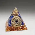 Detailed close-up view of a 5cm Orgonite pyramid with Lapis Lazuli and gold leaf decoration - Q1 Lapis Lazuli + Copper Coin / 5cm