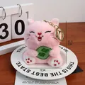 Adorable soft pink lucky cat plush keychain charm holding a green health tablet - With Gold Keychain / Pink (Health)