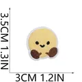 Detailed view of cute yellow round embroidered smile patch with dimensions 3.5x3cm - Cartoon Tennis Ball Yellow (C31HB-055-04) / 1 Piece