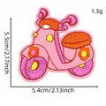 Detail view of pink cartoon scooter embroidery patch with dimensions 5.5 x 5.4 cm - Pink Motorcycle Style (8#)