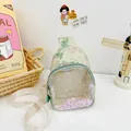 Mignonne sacoche poitrine enfant verte avec un design ludique de paillettes mobiles - Taille unique / Vert