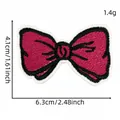 Detailed view of pink bow embroidery patch with size measurements 6.3x4.1cm - Rose Red Bow Style (16#)
