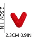 Detailed view of red chenille letter V embroidery patch with size markings in CM and IN - Letter V (S19ZM-05-V) / Red