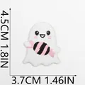 Macro view of cute Halloween ghost embroidery patch with candy, measuring 4.5cm by 3.7cm - Cute Ghost with Pumpkin (C7BF-082-02)
