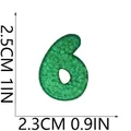 Close-up detail of a green chenille number 6 embroidered patch with clear dimension markings - Number 6 (S19ZM-05-7) / Green