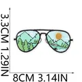 Detail view of embroidered sunglasses patch with mountain and sun scenery, 8x3.3cm - Landscape Sunglasses (X10HL-11-17)