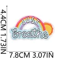 Macro view of rainbow embroidery patch showing Just Breathe text and dimensions - JUST breathe Rainbow (X10HL-11-02)