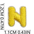Yellow embroidered letter N patch detail with 1.2cm x 1.1cm precise size markings - Letter N / 1 Piece