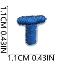 Close-up detail view of blue embroidered letter T patch showing 1.1cm mini size dimensions - Letter T