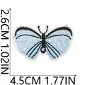 Dettaglio toppa ricamata a farfalla blu con dimensioni di misura 4,5x2,6 cm - Farfalla Blu Chiaro (X19HD-052-22)