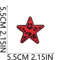 Detailed view of red leopard print star embroidery patch with 5.5cm size markers - Small Star (C26BW-088-23) / 5.5x5.5cm / Red Leopard