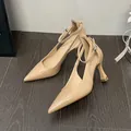 Beige patent leather pointed-toe high heels featuring an ankle strap and flared heel - 32 / 6.5cm Stiletto Heel / Nude