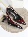 Detailed macro view of burgundy and black patent leather pointed toe slingback high heels - 35 / Black + Wine Red
