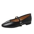 Elegant black Mary Jane flats with a decorative silver bow and buckled strap for women - 35 / Flat Mary Jane Shoes / Black