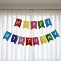 Colorful Happy Birthday fishtail banner for party decorations in various vibrant colors - Swallowtail Banner / Colorful