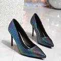 Close-up of iridescent sequin stiletto heels with a sharp pointed toe for formal events. - 35 / Laser Grey
