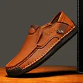 Premium men's brown hand-stitched leather loafers featuring a slip-on driving shoe design - 38 / Tan