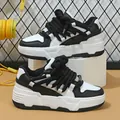 Stylish black and white platform skate shoes featuring unique thick rope lace details - 35 / Black and White