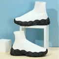Breathable white knit sock sneakers with chunky black speckled platform soles. - 35 / 白色黑底