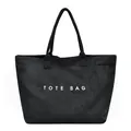 Sac cabas minimaliste en daim noir avec inscription TOTE BAG blanche pour le bureau. - Noir