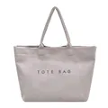Sac cabas rétro en daim gris-beige minimaliste avec l'imprimé lettres TOTE BAG - Gris