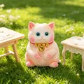 Adorable pink and white cat squishy stress relief toy with golden bell collar outdoors - S / Orange Cat