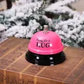 Close-up of pink service call bell with Ring for a HUG text on vintage background - Pink Bell (Ring for a HUG)