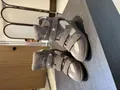 Detail view of women's high-top wedge sneakers with suede velcro straps and star studs - 37 / Khaki