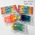 Macro detail of three gradient popsicle squishy toys with colorful Pinch Family packaging - Popsicle Squishy / Random Color