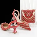 Detailed view of red rhinestone-embellished high heel sandals and matching evening clutch bag set - 38 / Red