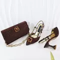 Close-up of brown rhinestone evening sandal and matching clutch set with gem details - Coffee