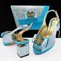 Elegante hellblaue Peep-Toe-Schuhe mit Leopardenmuster und passende Abendtasche - 38 / Leopardenmuster Strass Schleife Schuh-Taschen-Set (MM1170) / Himmelblau