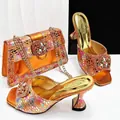 Orange metallic square toe sandals with rhinestones and matching polka dot evening bag set - Orange