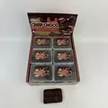 Box of 12 realistic chocolate bar squishy toys for stress relief and sensory fun. - Chocolate Crust