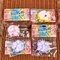 Colorful cat paw shaped squishy stress relief toy presented in retail packaging - Small Cat Paw / Random Color