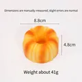 Slow rebound PU squishy toy shaped like a mini Bundt cake bread for stress relief - Dark Stump Bread