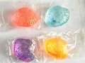 Colorful shell-shaped stress squishy toys with glitter filling in individual bags - Small Shell / Orange