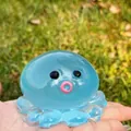 Jouet pieuvre bleu translucide anti-stress, dimensions 6cm x 5cm, poids total 85g - Poulpe à Bulles / Bleu Transparent