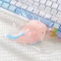 Soft pink and blue whale stress relief squeeze toy presented in clear plastic packaging - Pink Ugly Fish Squishy